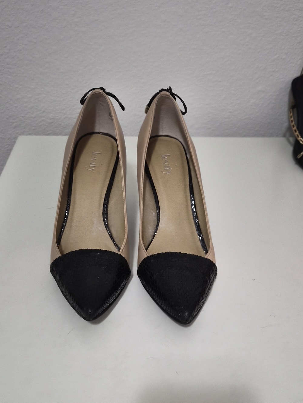 levity Two-Tone Pointed Toe Pumps in Beige and Black